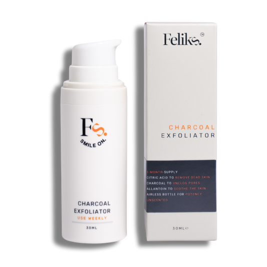 Charcoal chemical Exfoliator AHA BHA in charcoal with glycerin, allantoin, citric acid, glycolic acid, lactic acid, salicylic acid in airless bottle next to packaging. feliks skincare